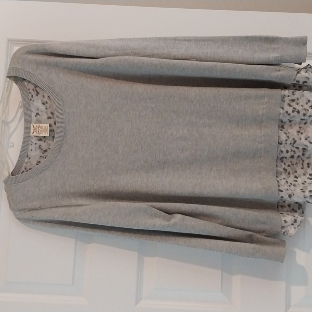 Long sleeved embellished knit top